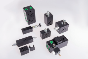 Sandwich mounting valves