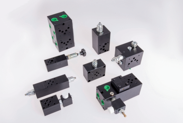 Sandwich mounting valves